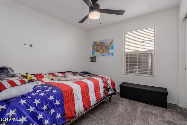 bedroom featuring ceiling fan and carpet floors