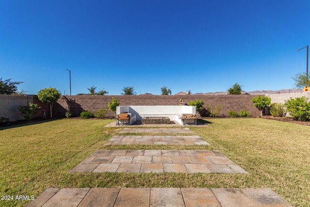 view of yard with a patio area