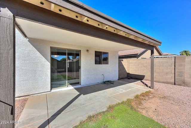 back of house with a patio area