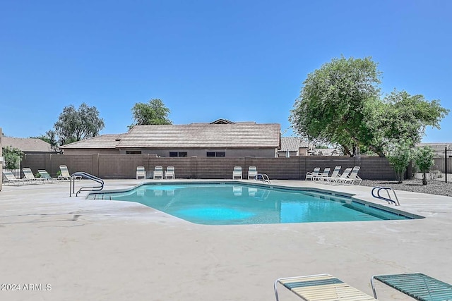 view of pool featuring a patio