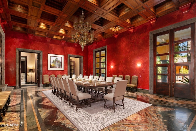 dining area featuring beamed ceiling, wood ceiling, a chandelier, and coffered ceiling