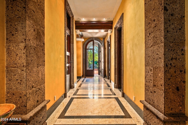 8100 N 68th St, Paradise Valley, AZ 85253 - hall with inlaid floor details, light marble finish flooring, recessed lighting, and ornamental molding