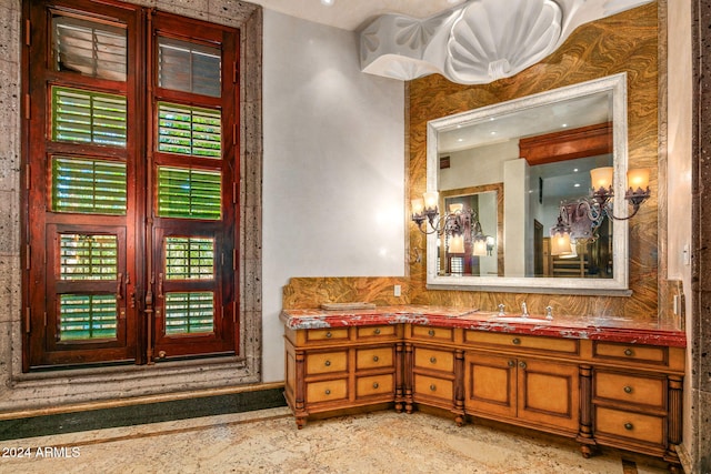 bathroom with vanity and plenty of natural light