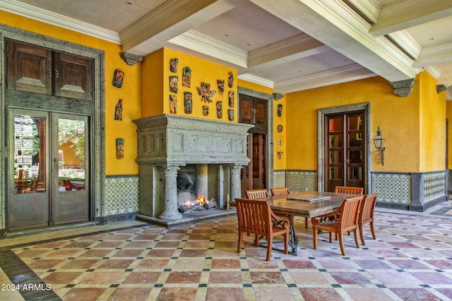8100 N 68th St, Paradise Valley, AZ 85253 - dining space featuring ornamental molding, wainscoting, and a multi sided fireplace