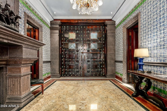 wine cellar featuring ornamental molding and an inviting chandelier