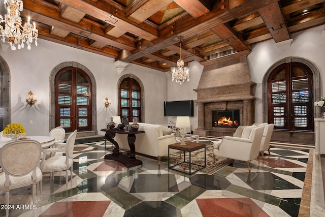 living room featuring a high ceiling, beam ceiling, a premium fireplace, and coffered ceiling