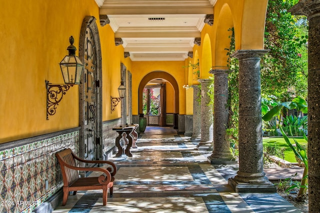 8100 N 68th St, Paradise Valley, AZ 85253 - corridor featuring arched walkways and decorative columns