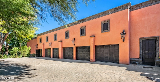 view of building exterior with a garage