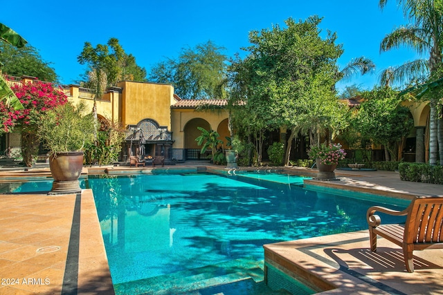 view of pool with a patio