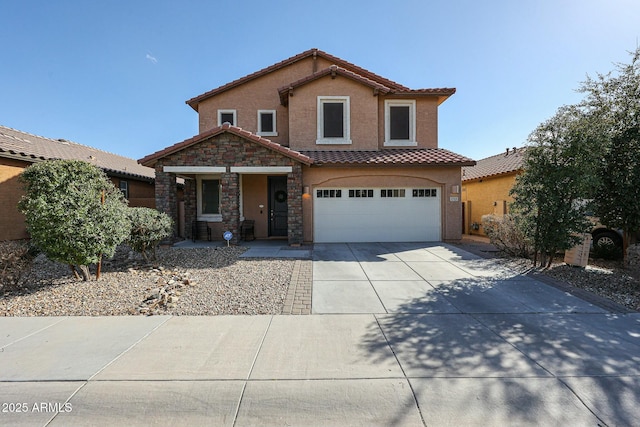 traditional-style house featuring concrete driveway, stone siding, a tile roof, an attached garage, and stucco siding