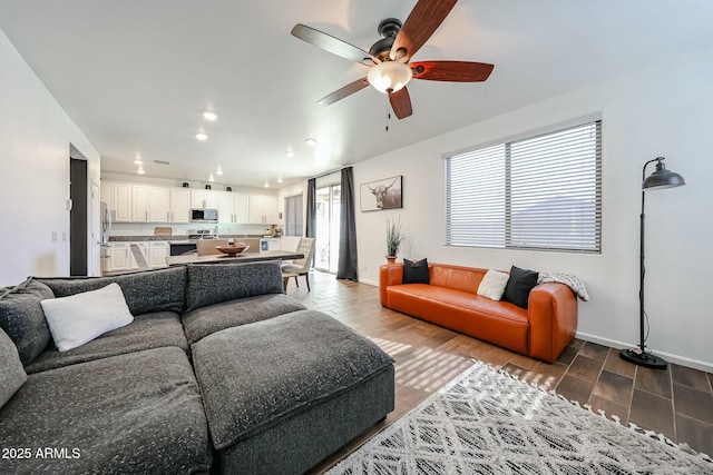1713 W Cottonwood Ln, Phoenix, AZ 85045 - living room featuring a ceiling fan, baseboards, wood finished floors, and recessed lighting