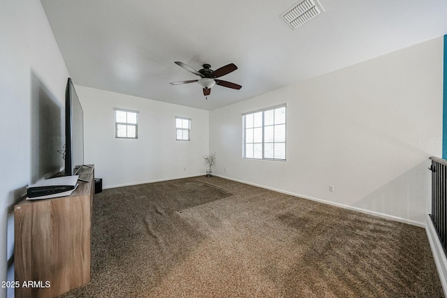 1713 W Cottonwood Ln, Phoenix, AZ 85045 - unfurnished living room featuring carpet floors, a ceiling fan, visible vents, and baseboards