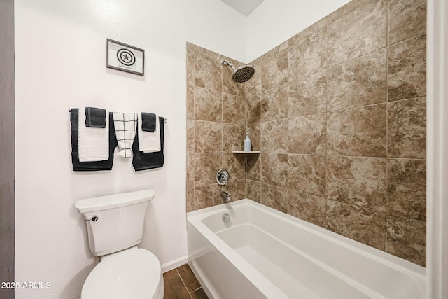 1713 W Cottonwood Ln, Phoenix, AZ 85045 - full bathroom with washtub / shower combination, wood finished floors, toilet, and baseboards