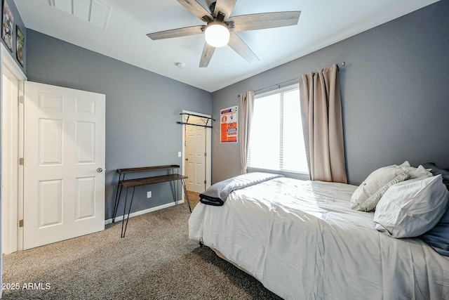 1713 W Cottonwood Ln, Phoenix, AZ 85045 - carpeted bedroom featuring ceiling fan, visible vents, and baseboards