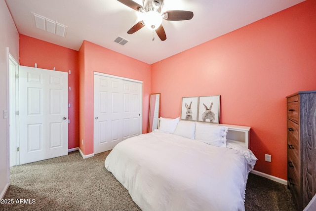 1713 W Cottonwood Ln, Phoenix, AZ 85045 - bedroom with carpet floors, a closet, visible vents, and baseboards