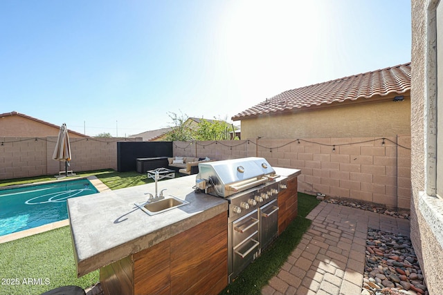 1713 W Cottonwood Ln, Phoenix, AZ 85045 - view of patio with a sink, area for grilling, and a fenced backyard