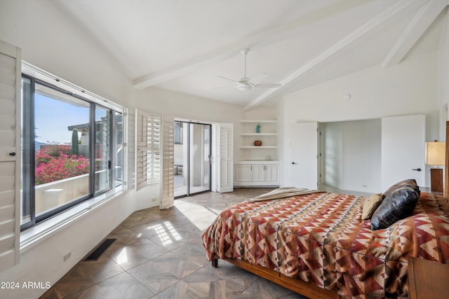 bedroom featuring ceiling fan and lofted ceiling with beams