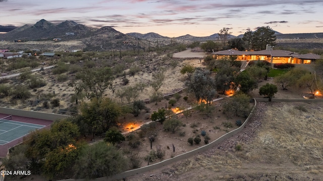 aerial view at dusk with a mountain view