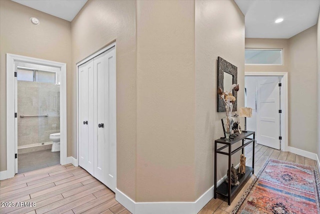 hall featuring light hardwood / wood-style floors