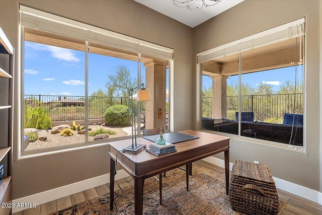 home office featuring hardwood / wood-style flooring