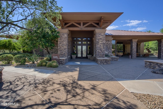 doorway to property featuring french doors and a patio area