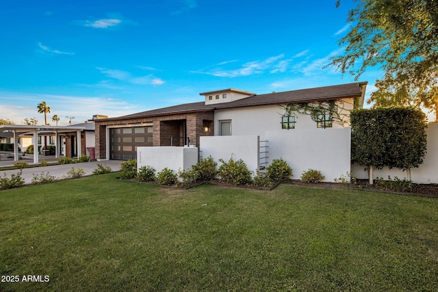 view of front of property featuring an attached garage, stucco siding, driveway, and stone siding