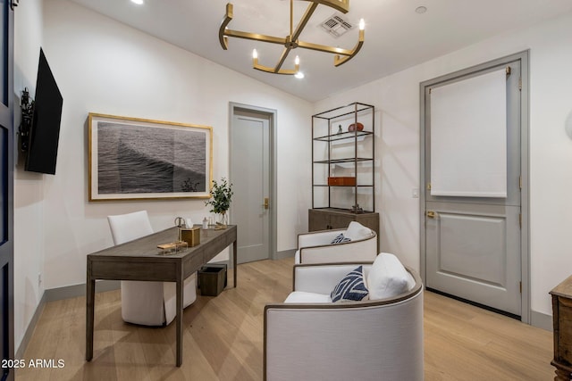 office space with a chandelier, light wood-type flooring, lofted ceiling, baseboards, and recessed lighting