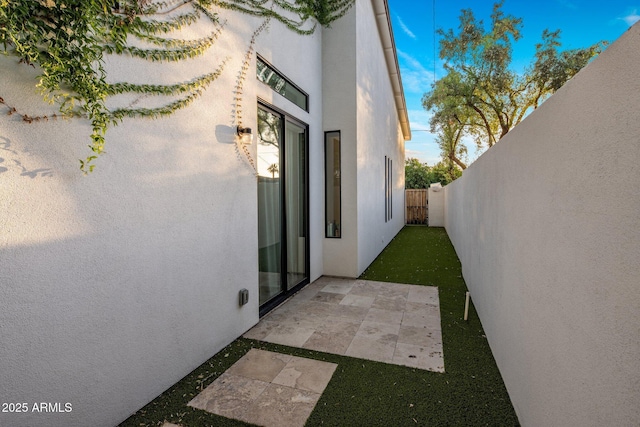 view of yard featuring a patio and fence