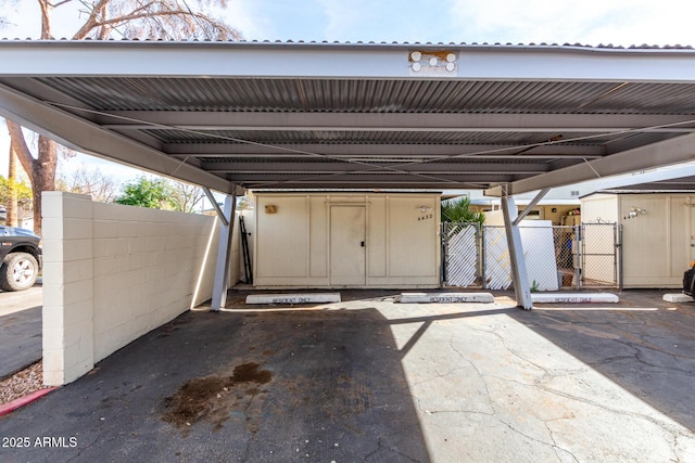 view of vehicle parking featuring a carport