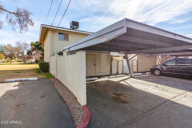 view of parking with a carport