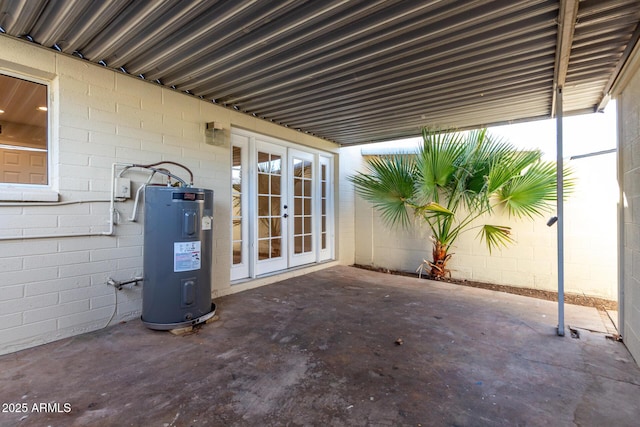 view of patio / terrace featuring water heater and french doors