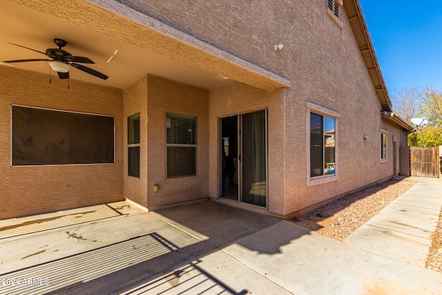 exterior space with a patio area and ceiling fan