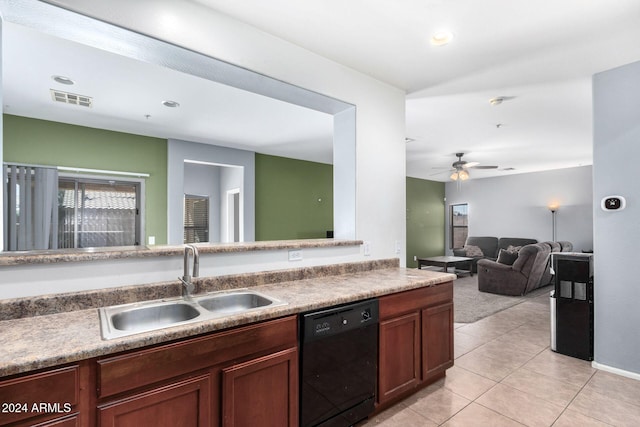 kitchen featuring black dishwasher, sink, ceiling fan, and light tile patterned floors