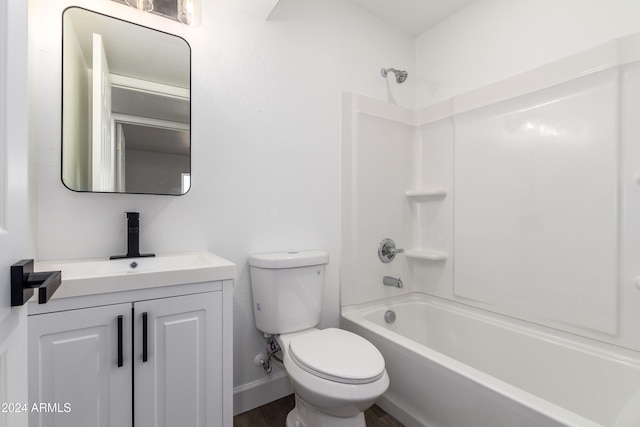 full bathroom with vanity, tub / shower combination, hardwood / wood-style flooring, and toilet