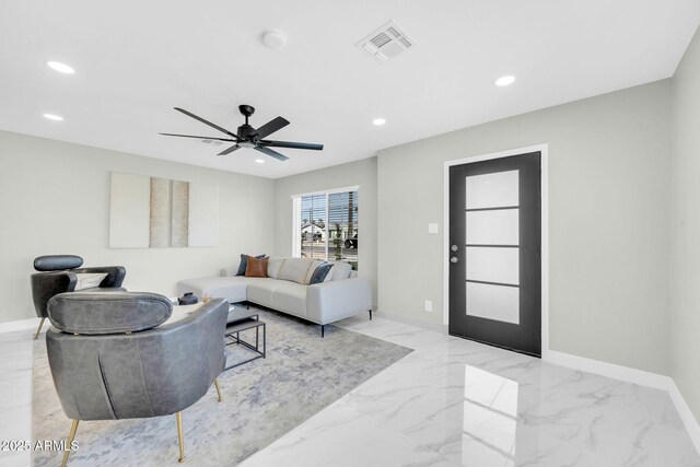 2926 N 16th Ave, Phoenix, AZ 85015 - living room featuring marble finish floor, baseboards, visible vents, and recessed lighting
