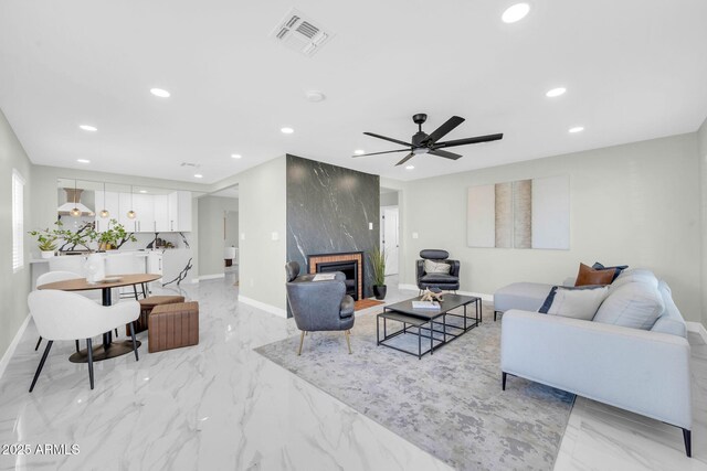 2926 N 16th Ave, Phoenix, AZ 85015 - living room with marble finish floor, visible vents, and recessed lighting