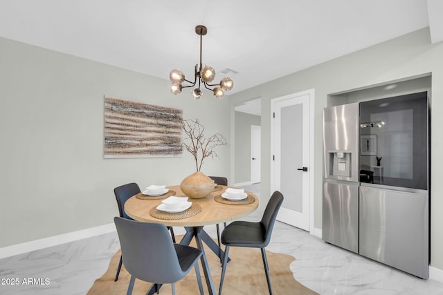 2926 N 16th Ave, Phoenix, AZ 85015 - dining space featuring visible vents, baseboards, marble finish floor, and an inviting chandelier
