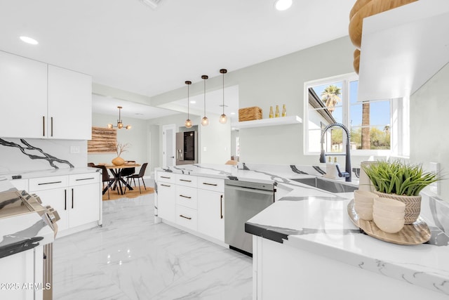 2926 N 16th Ave, Phoenix, AZ 85015 - kitchen featuring a peninsula, a chandelier, marble finish floor, dishwasher, and a sink