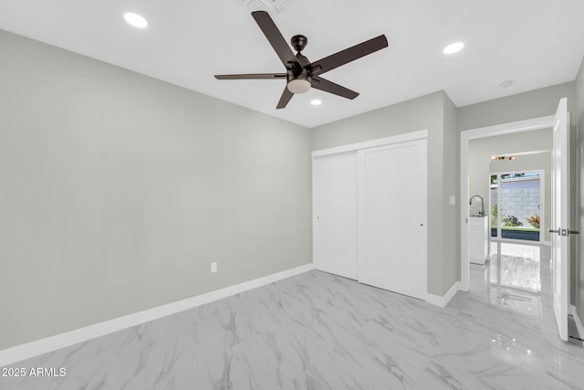 2926 N 16th Ave, Phoenix, AZ 85015 - unfurnished bedroom featuring marble finish floor, baseboards, and recessed lighting