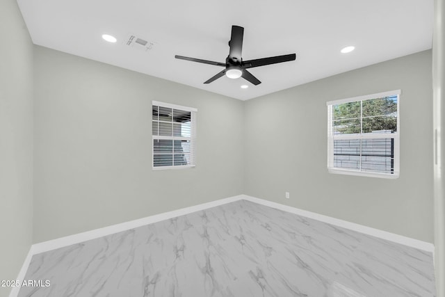 2926 N 16th Ave, Phoenix, AZ 85015 - spare room with baseboards, a ceiling fan, and recessed lighting