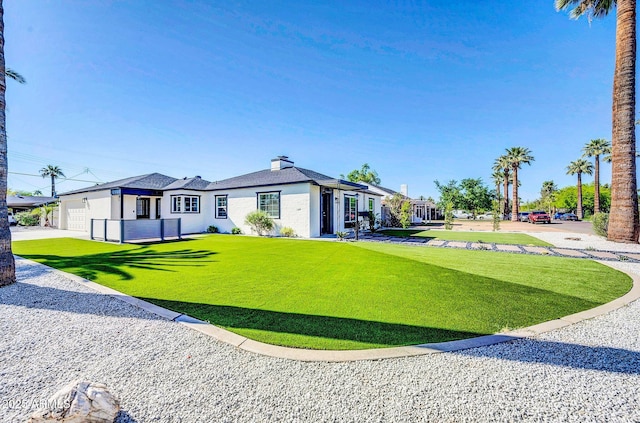 2926 N 16th Ave, Phoenix, AZ 85015 - exterior space with a front lawn, an attached garage, and concrete driveway