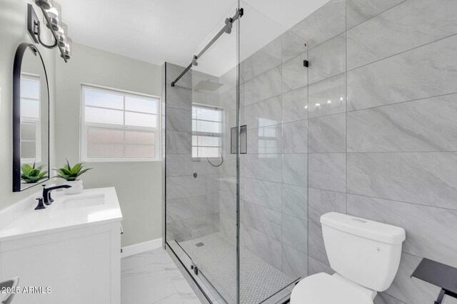 2926 N 16th Ave, Phoenix, AZ 85015 - full bath with toilet, tiled shower, marble finish floor, and vanity