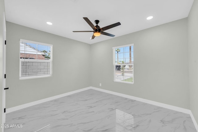 2926 N 16th Ave, Phoenix, AZ 85015 - empty room with recessed lighting, marble finish floor, baseboards, and a ceiling fan
