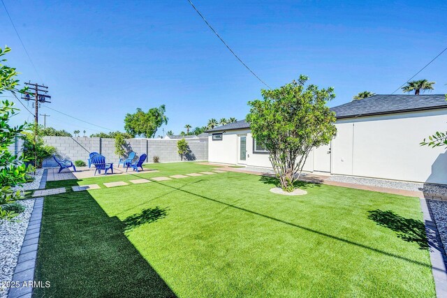 2926 N 16th Ave, Phoenix, AZ 85015 - view of yard with a patio and a fenced backyard