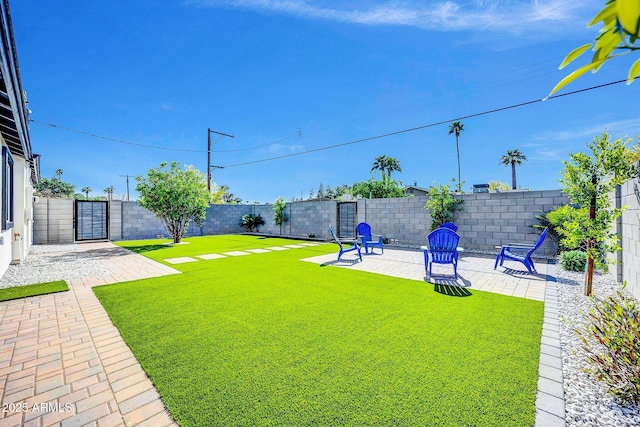 2926 N 16th Ave, Phoenix, AZ 85015 - view of yard featuring a patio area and a fenced backyard
