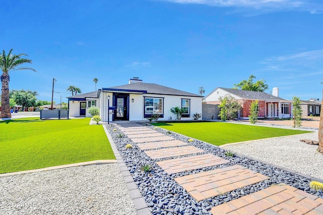 2926 N 16th Ave, Phoenix, AZ 85015 - ranch-style home with a chimney and a front lawn