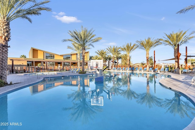 view of swimming pool with a patio