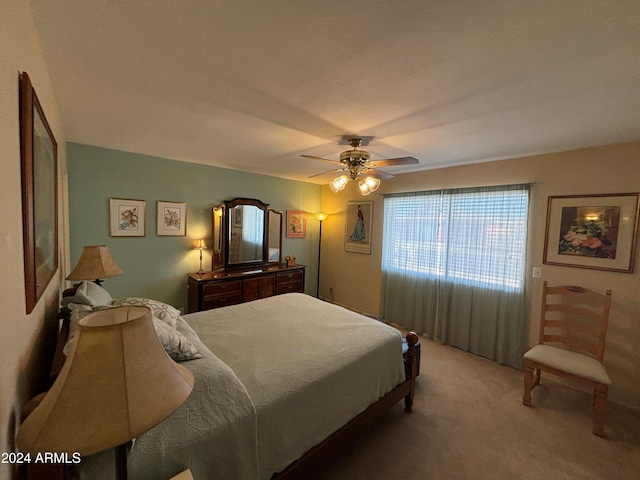 bedroom featuring ceiling fan and carpet floors