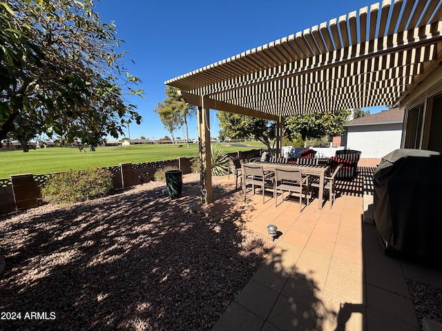 view of patio / terrace featuring area for grilling and a pergola