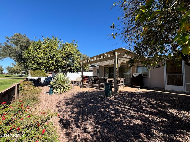 view of yard featuring a pergola and a patio area